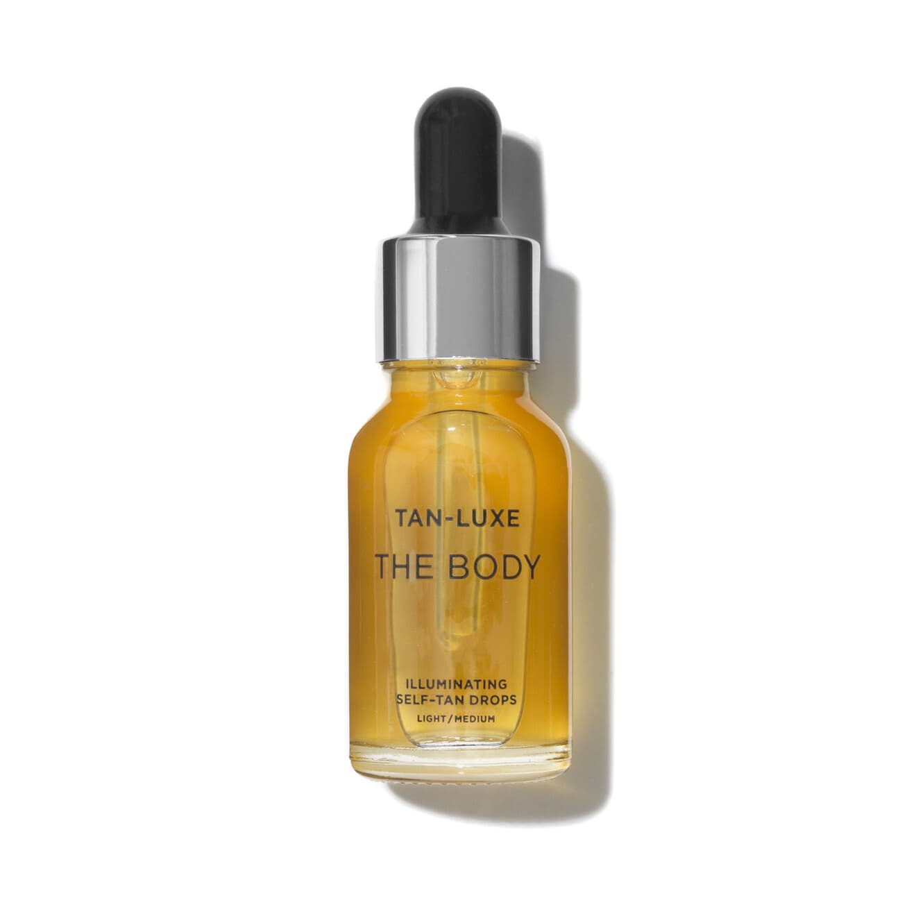 The Body Illuminating Tan Drops - light/medium